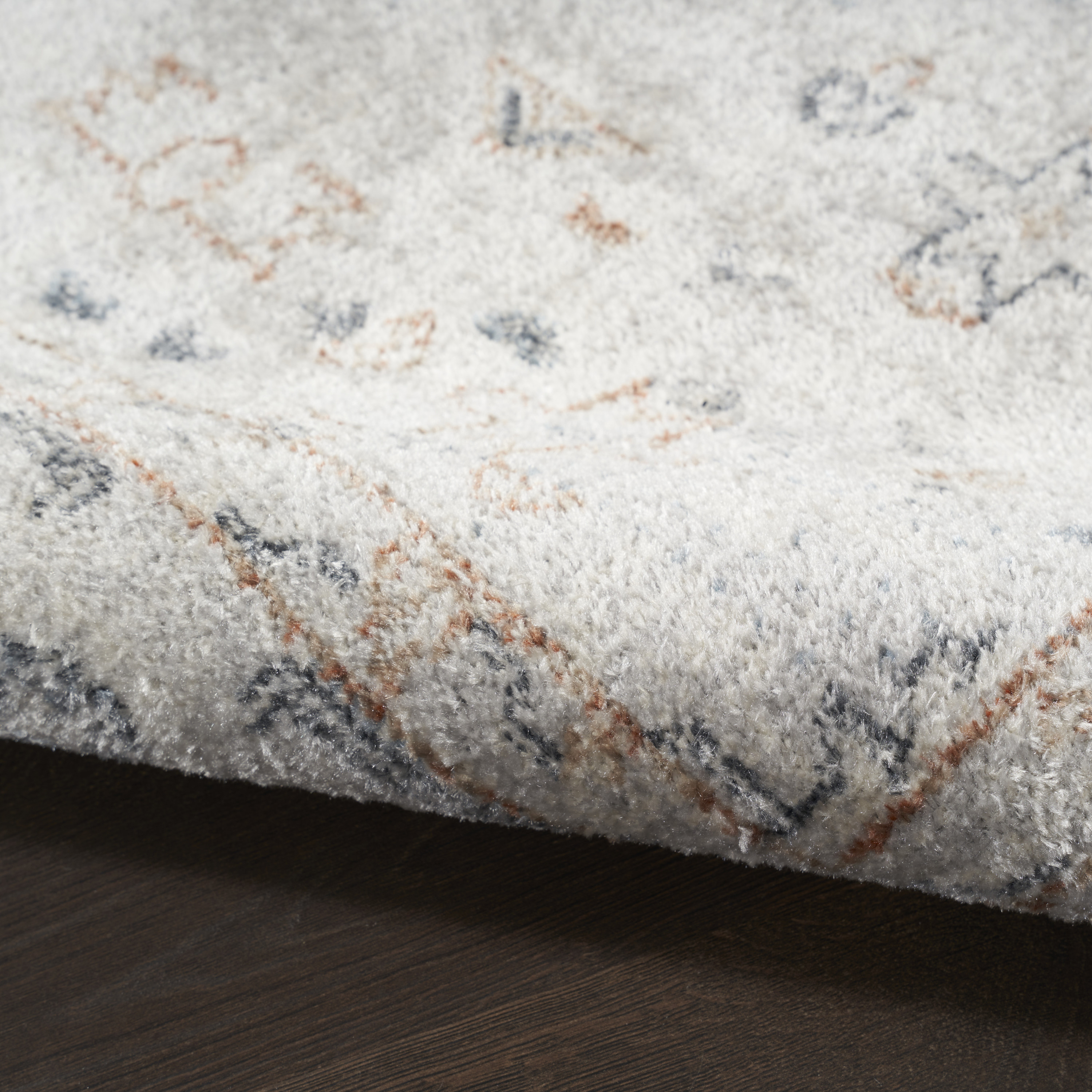Nourison Astra Machine Washable 6'7" x 9' Light Blue Vintage Indoor Rug