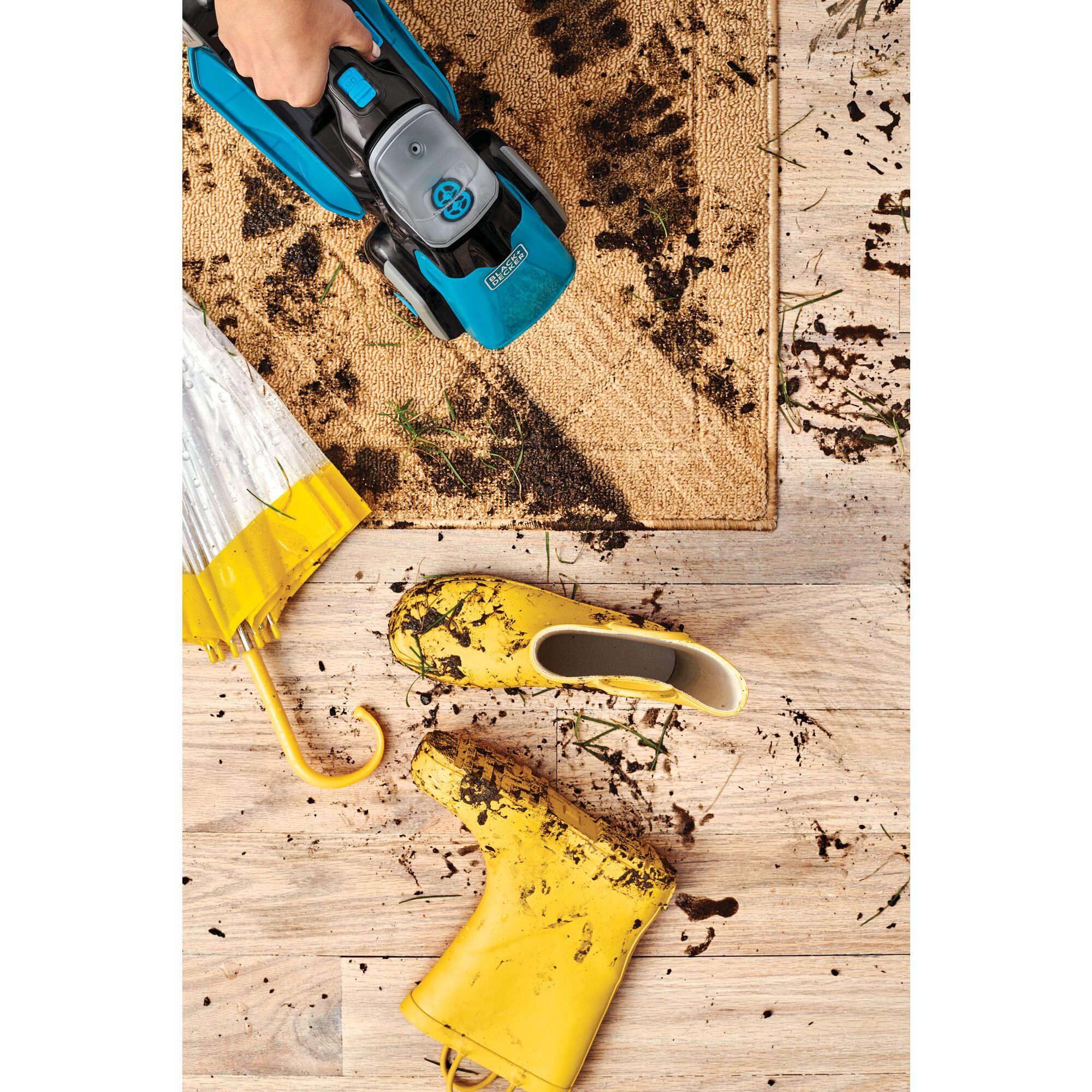 Spillbuster cordless spill and spot cleaner with powered scrub brush being used.