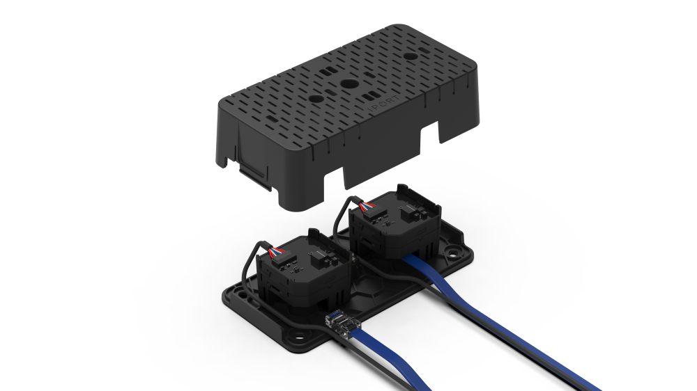 PoE+ SecureMount is an enclosure that provides a safe place for 1 or 2 PoE+ Network Adapters. It's mounting plate can be secured under a table or somewhere safe, and the top case has two snap in cavities for the adapters along with cable routing channels to prevent any unwanted cable tugs. Once installed, LEDs from the PoE adapters inside are easily visible through the top.