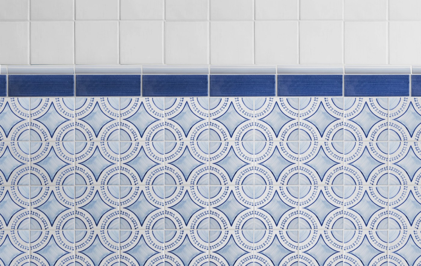 a blue and white tiled wall.