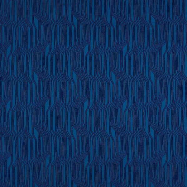 Textured blue wallpaper with raised, wavy vertical navy ribbed stripes forming repeating undulating columns; close-up, evenly lit flat surface with no visible surroundings.