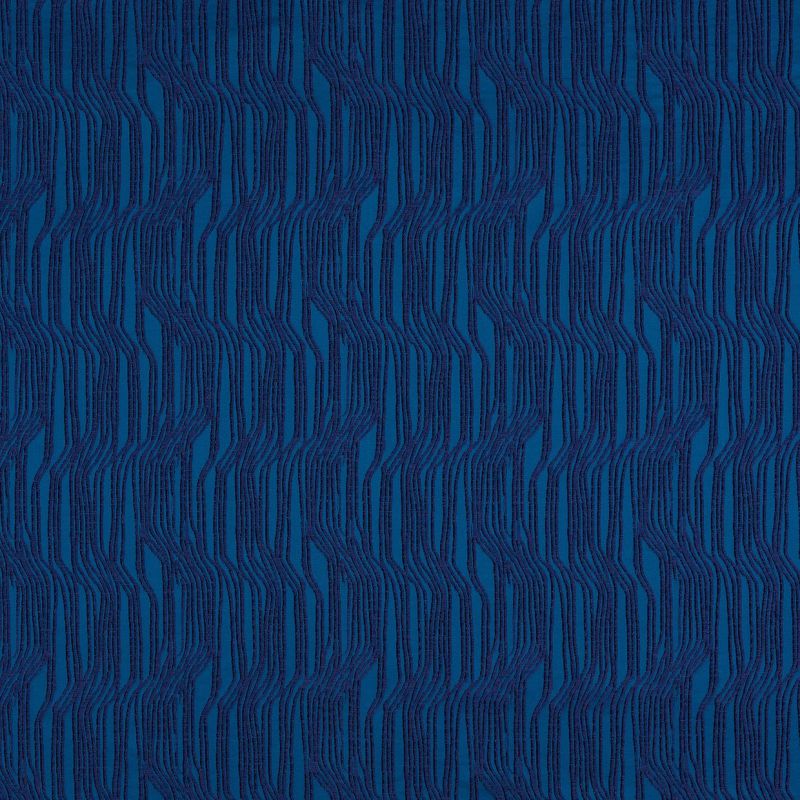 Textured blue wallpaper with raised, wavy vertical navy ribbed stripes forming repeating undulating columns; close-up, evenly lit flat surface with no visible surroundings.