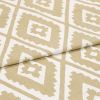 Beige-and-white geometric patterned fabric, folded diagonally to reveal repeating diamond motifs; lying flat with a visible crease, close-up studio view with neutral lighting emphasizing woven texture.