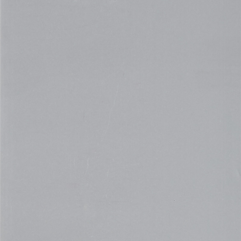 Light gray textured sheet with faint creases occupying the entire frame, lying flat under soft, even lighting with no visible surroundings.