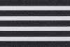 Zebra-style roller blind: alternating opaque white and textured charcoal-gray woven horizontal bands filling the frame; bands aligned to block or filter light in a close-up interior view.