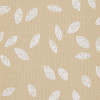 Textured beige wallpaper with scattered white, chalky leaf motifs covering a fabric-like surface; motifs lie flat, repeating uniformly under soft, even lighting.