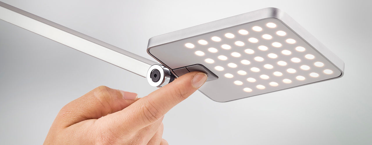 Attenzia dims at the touch of a button and remembers your brightness setting the next time you turn on the lamp.