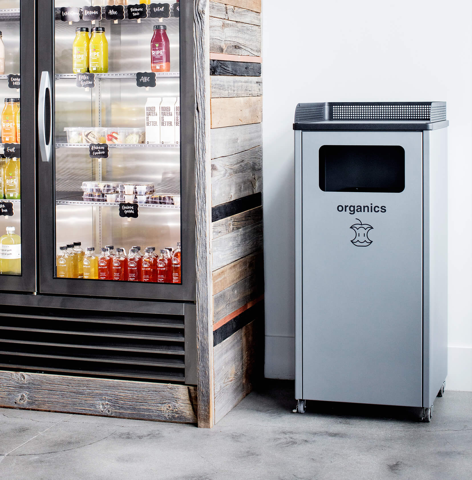 single organics collection bin made from durable steel with powder coated finish in a food store