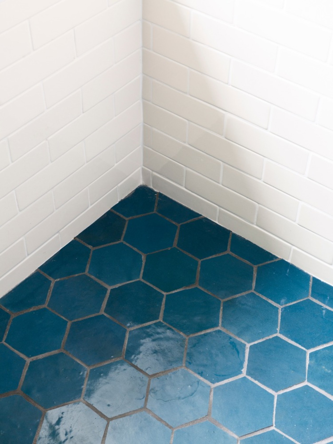 a blue hexagon tiled floor.