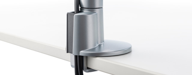 Novus CLU Base Mounts offer the flexibility to place your monitors anywhere on the desk surface.
