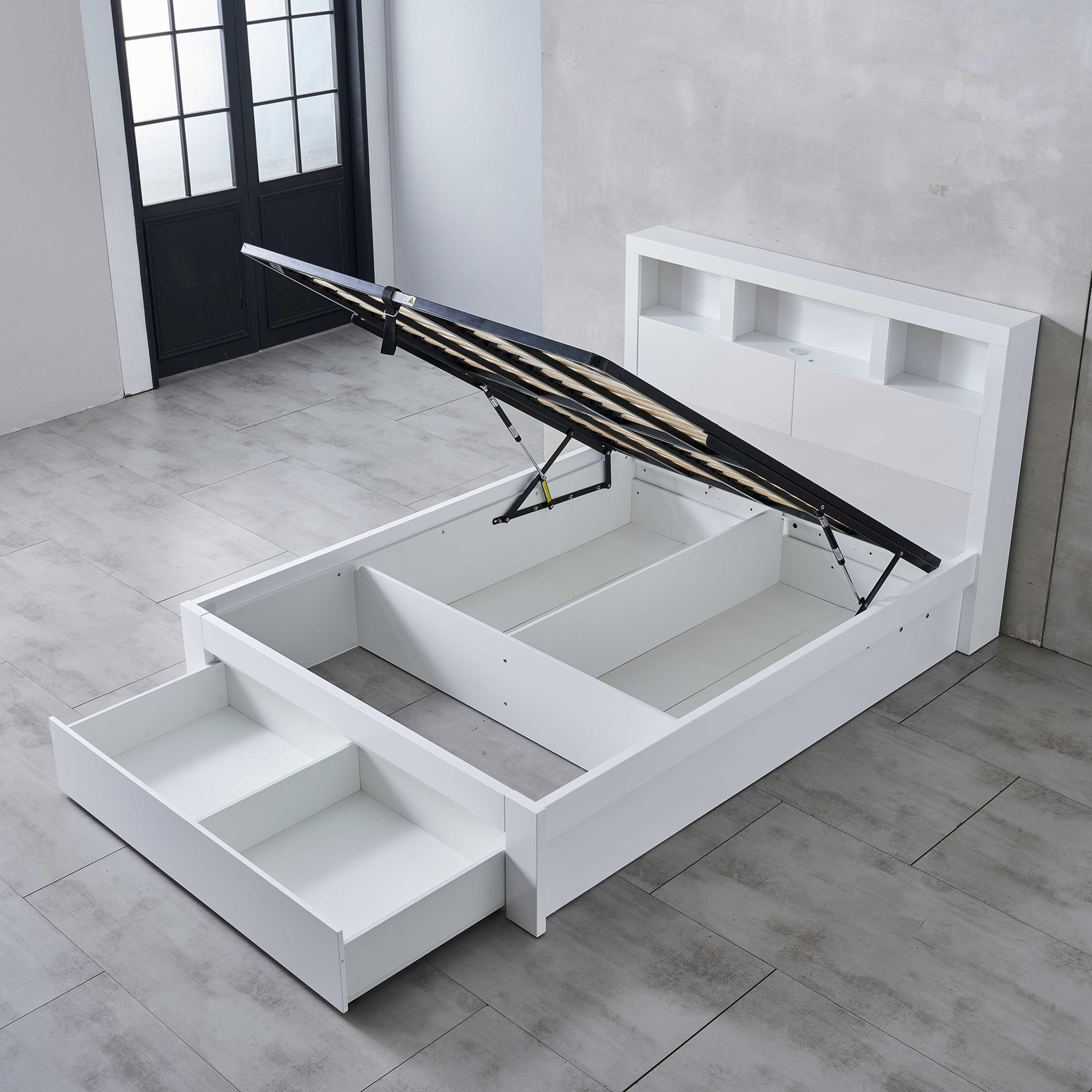 Lifestyle image of the  Lugano Bed Frame, Front Slat Gas Lift & End Drawer Base, Ivory White from Forty Winks
