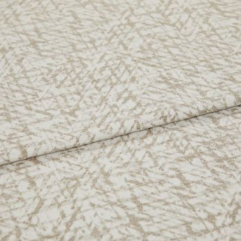 Textured beige-and-white fabric with an abstract, twiglike pattern, folded and layered once; close-up on a flat surface with soft, even lighting, suggesting a fabric sample or upholstery swatch.