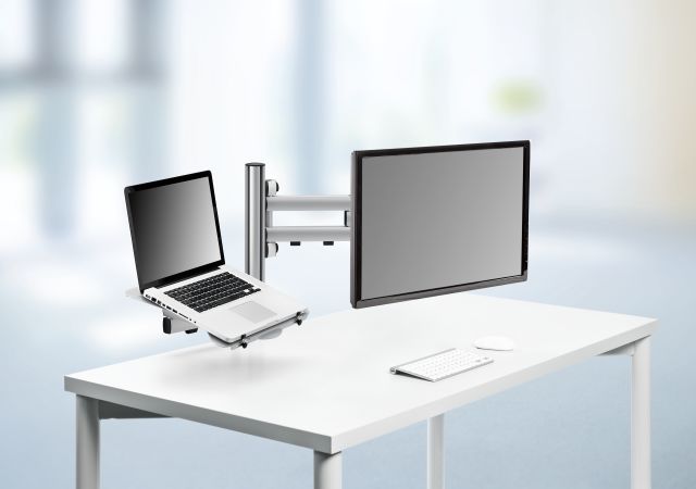 A complete workstation designed to elevate a laptop and a monitor.