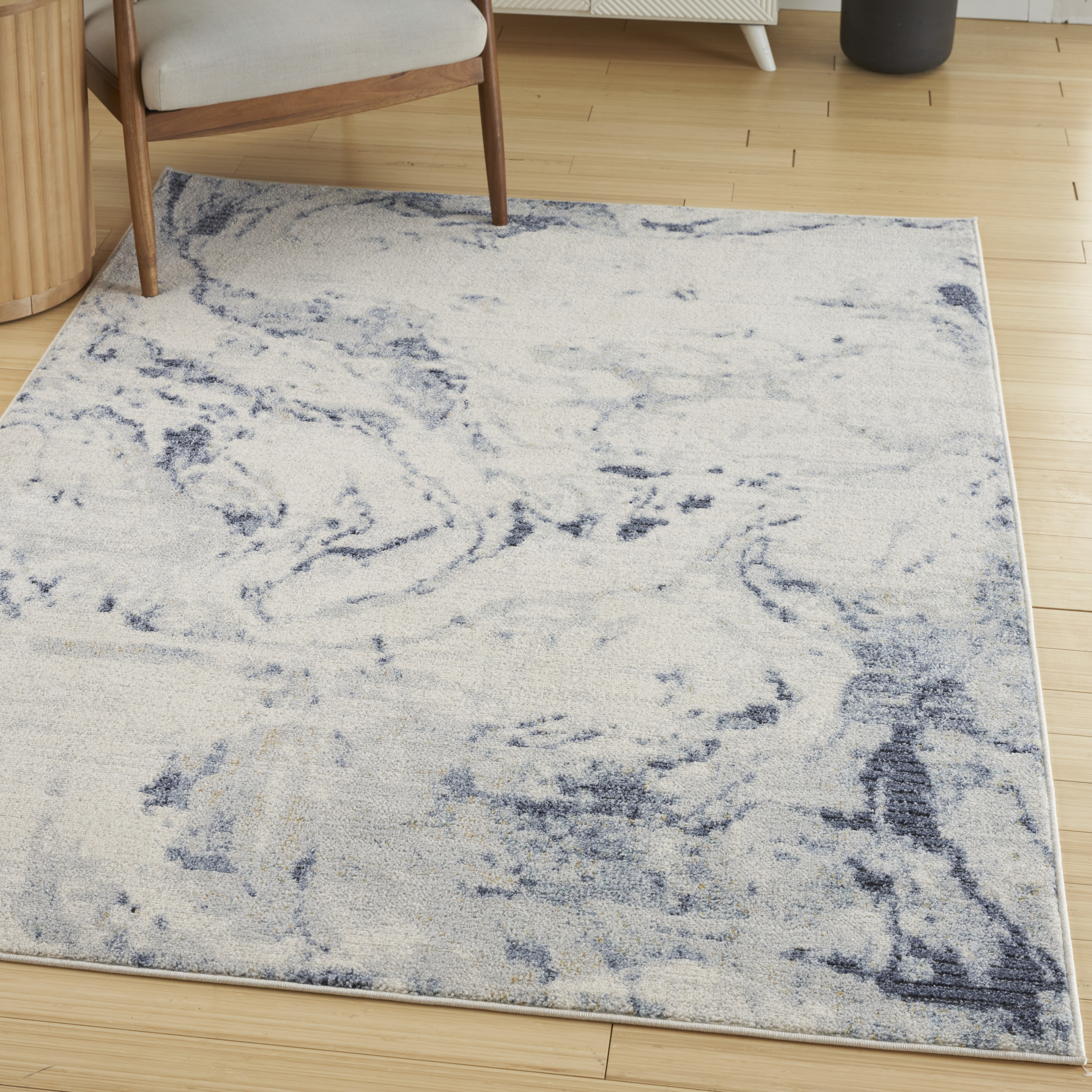 Nourison Motion 5'3" x 7' Ivory Blue Modern Indoor Rug