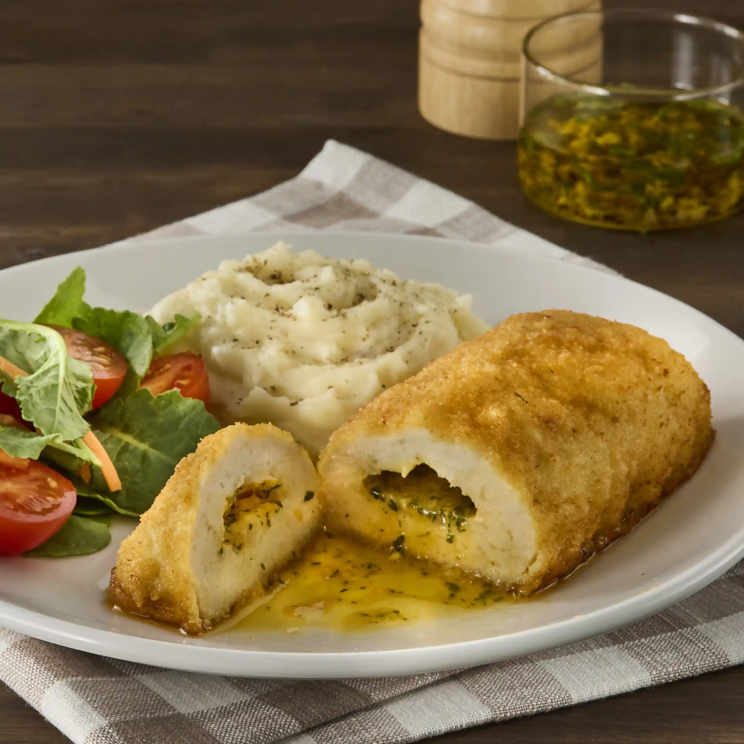 Barber Foods® Uncooked Breaded Chicken Kiev Boneless Stuffed Chicken Breasts 7 oz. https://images.salsify.com/image/upload/s--aWaTTJ1G--/q_25/9ff7b91da70f6653c7e0e330e236073594b031f8.webp