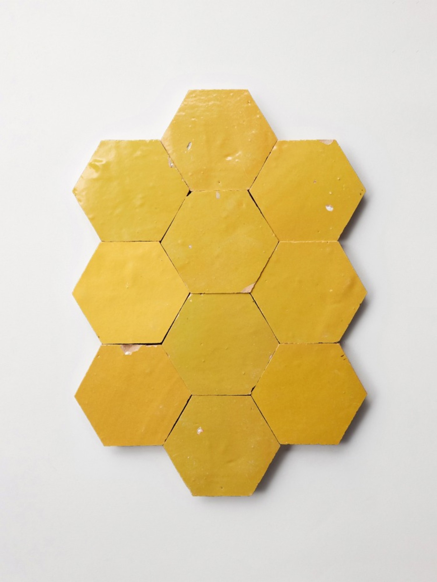 yellow hexagon tiles on a white background.