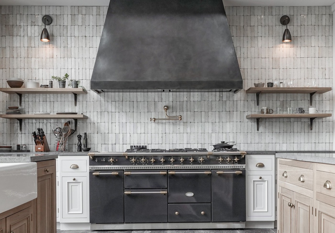 a kitchen with a tiled backsplash wall.