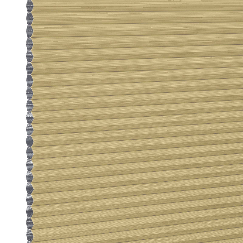 Honeycomb (cellular) blind, tan with silver inner cells, fully lowered and closed, filtering and blocking light; close-up view showing horizontal pleats and cell edges against a neutral interior background.