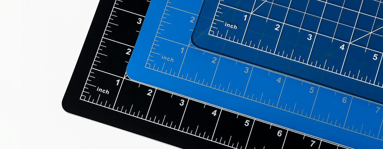 These professional-grade cutting mats features 5 layers of PVC construction with screened inch, metric, and angled alignment guides.
