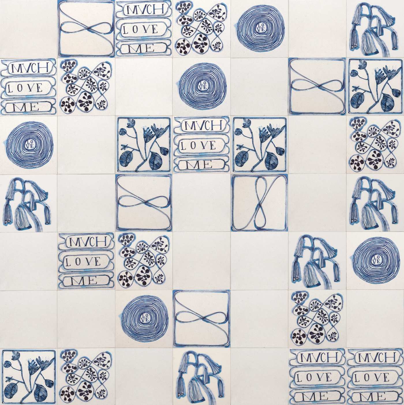 blue and white tiles with various designs on them.