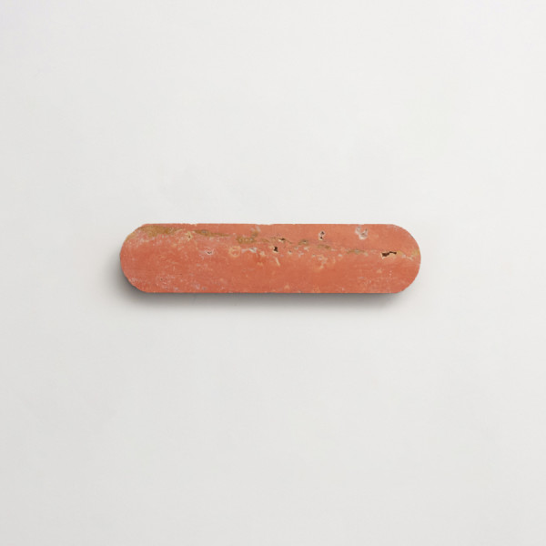 clé lapidary: smooth-cut ovals | oval petit mosaic sheet | honed | red travertine | sample 
