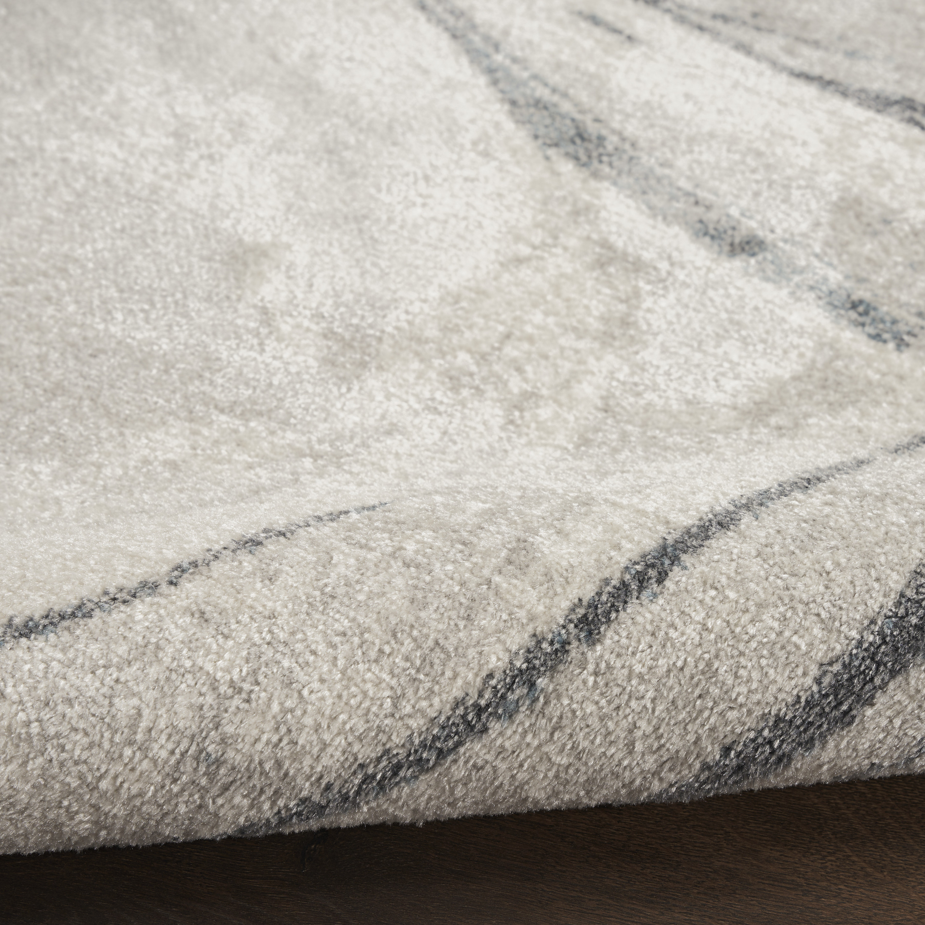 Nourison Astra Machine Washable 6'7" x 9' Silver Blue Modern Indoor Rug