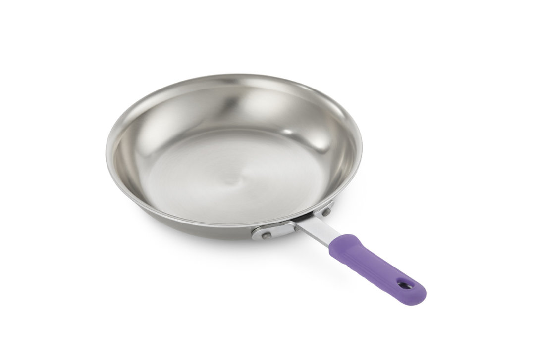 12-inch Tribute® 3-ply frying pan in natural finish with purple silicone handle