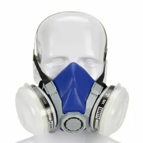 Industrial type respirator fitted over a mannequin head.