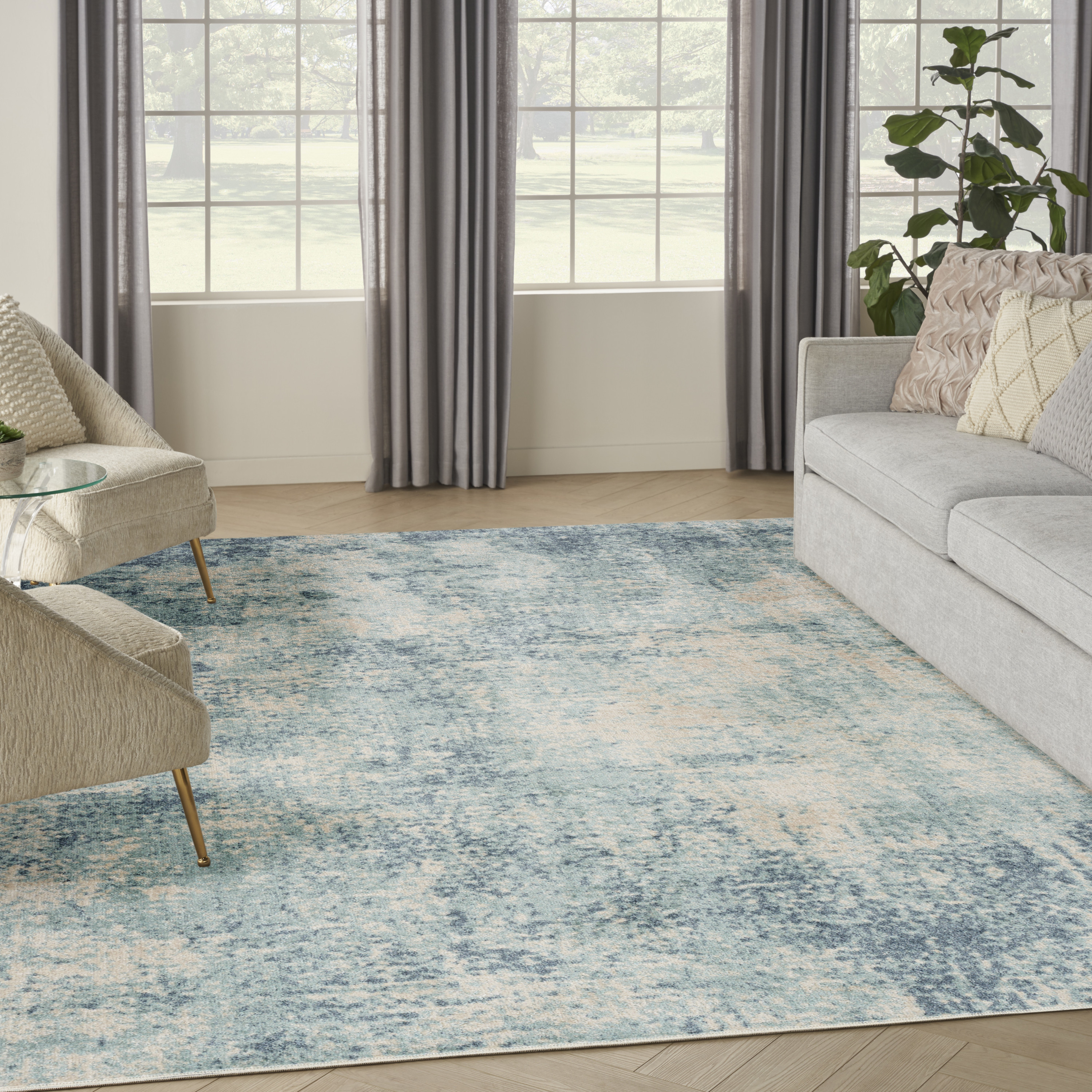 Nourison Astra Machine Washable 6'7" x 9' Blue Ivory Modern Indoor Rug