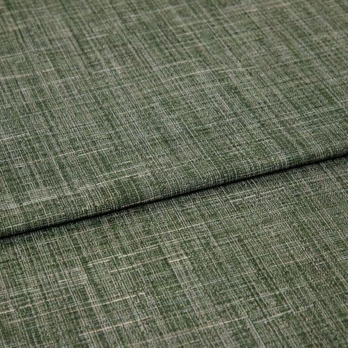 Green crosshatched woven fabric, folded in overlapping layers, displaying textured beige and olive threads; tightly lit close-up emphasizing the weave and subtle sheen on a neutral surface.