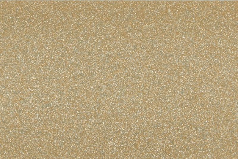 Fine golden-brown granular material with small reflective particles â€” forming a uniformly textured, glittering surface in a close-up, evenly lit view that fills the frame.