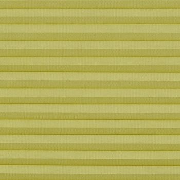 Pale yellow cellular (honeycomb) pleated blind, mounted and fully closed with evenly spaced horizontal cells; filtering and diffusing light, covering a window in an interior with soft, even lighting.