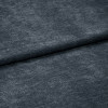 Dark gray textured fabric, folded horizontally with a visible soft nap; draped flat across a surface in a close-up, evenly lit composition with no surrounding context.