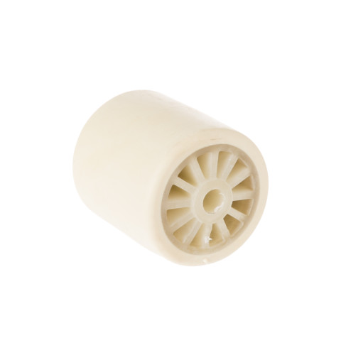 Refrigerator over mold rear wheel assembly