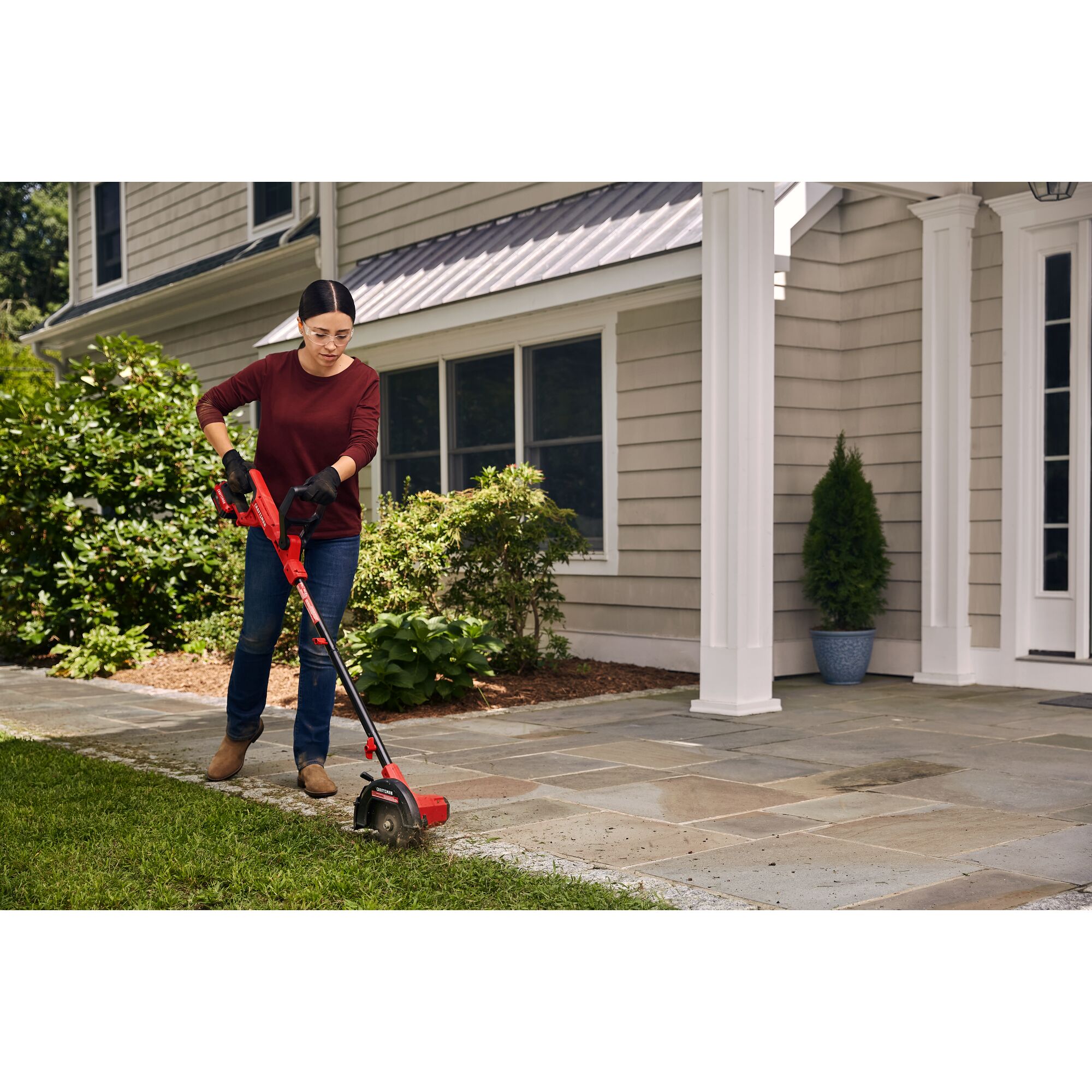 Cordless edger tool only being used for edging lawn by person.