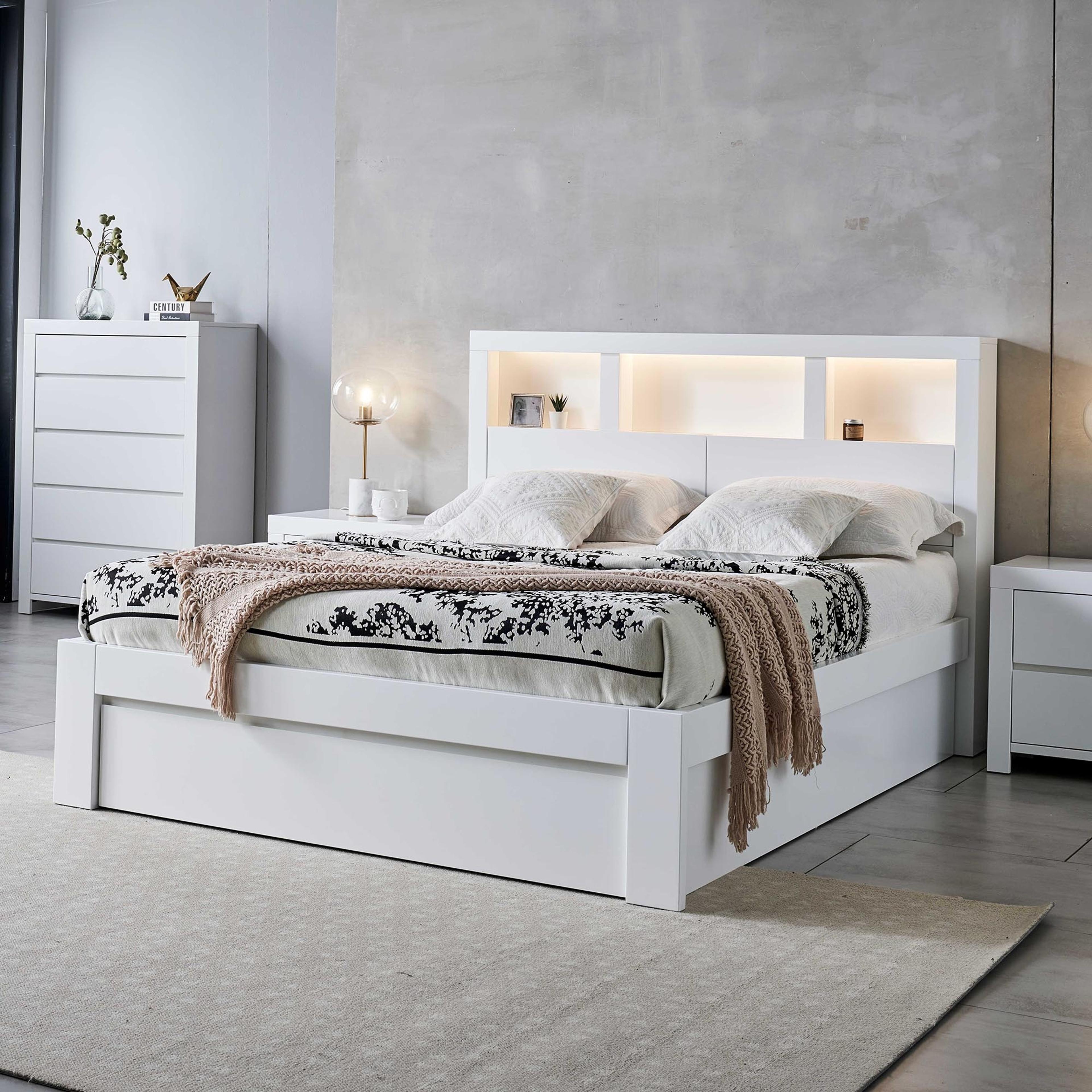 Lifestyle image of the  Lugano Bed Frame, Front Slat Gas Lift & End Drawer Base, Ivory White from Forty Winks