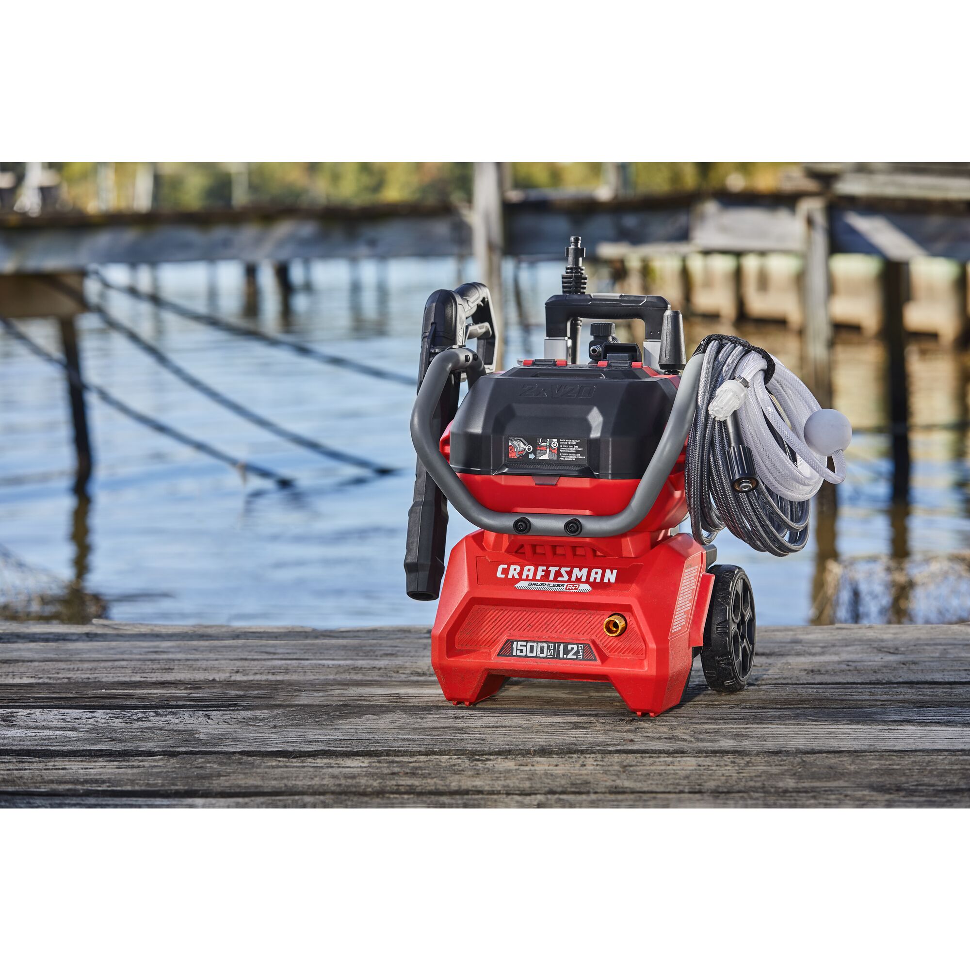 CRAFTSMAN 1500 PSI Pressure Washer sitting on pier with no person and water in background
