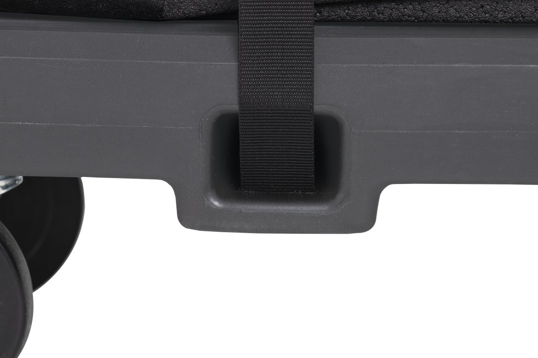 Flatbed utility dolly in dark gray with 5” casters and straps