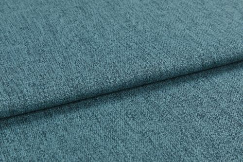 Teal textured upholstery fabric, folded into overlapping layers with visible weave and nap; lying flat as a close-up sample under soft diffuse lighting, showing subtle color variation.