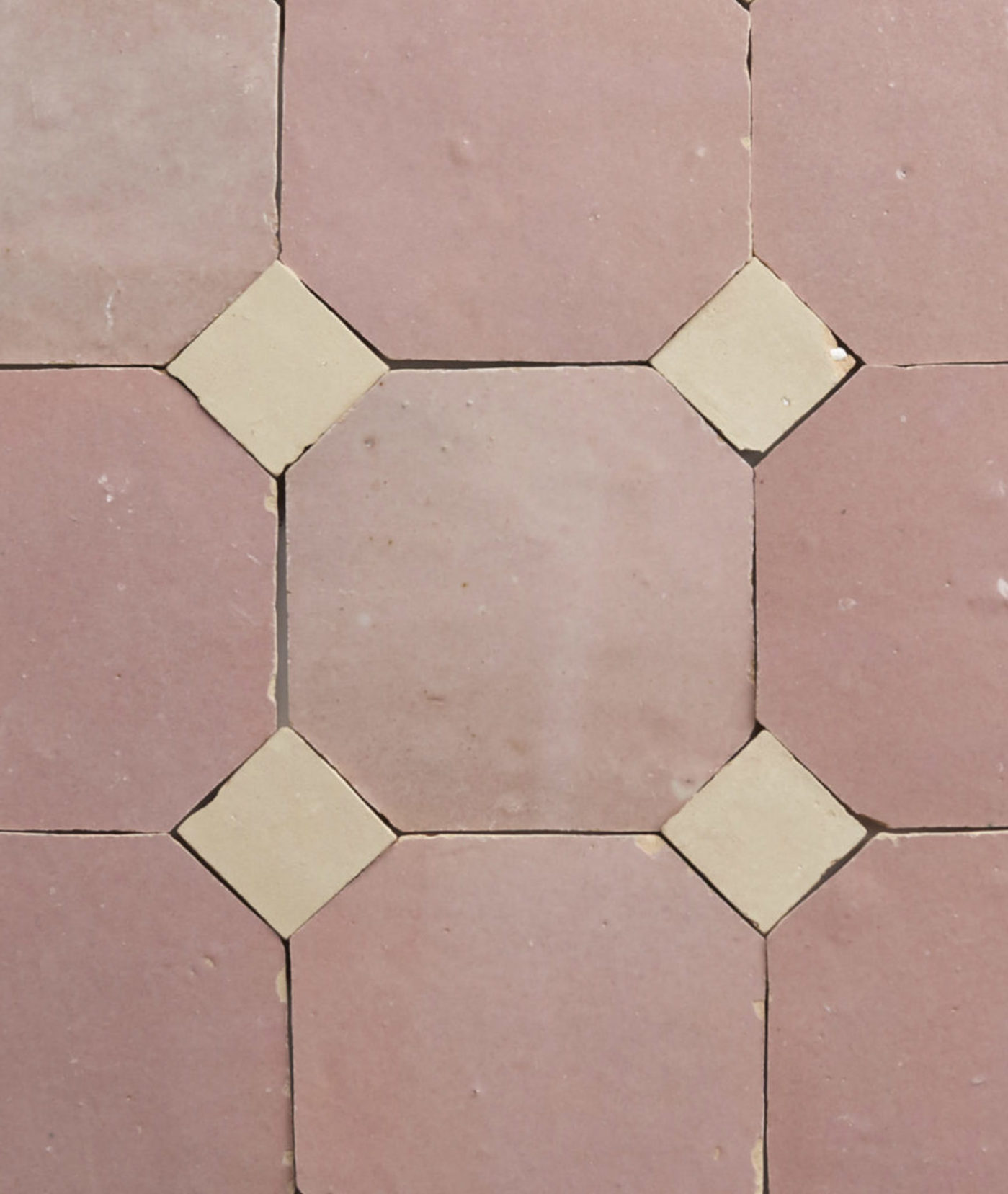 pink and yellow tiles arranged in a pattern.