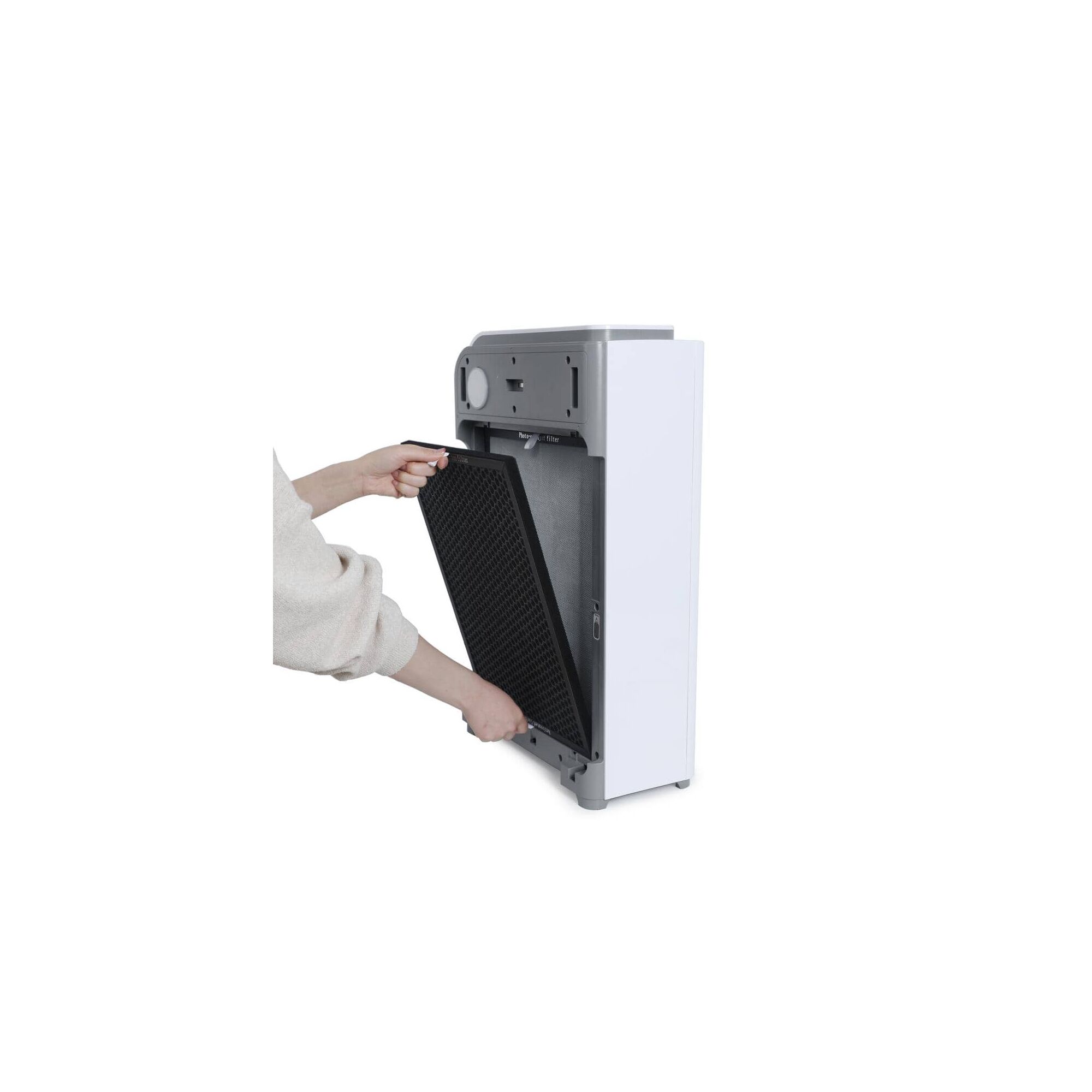 Person opening the back of the BLACK+DECKER Air Purifier unit
