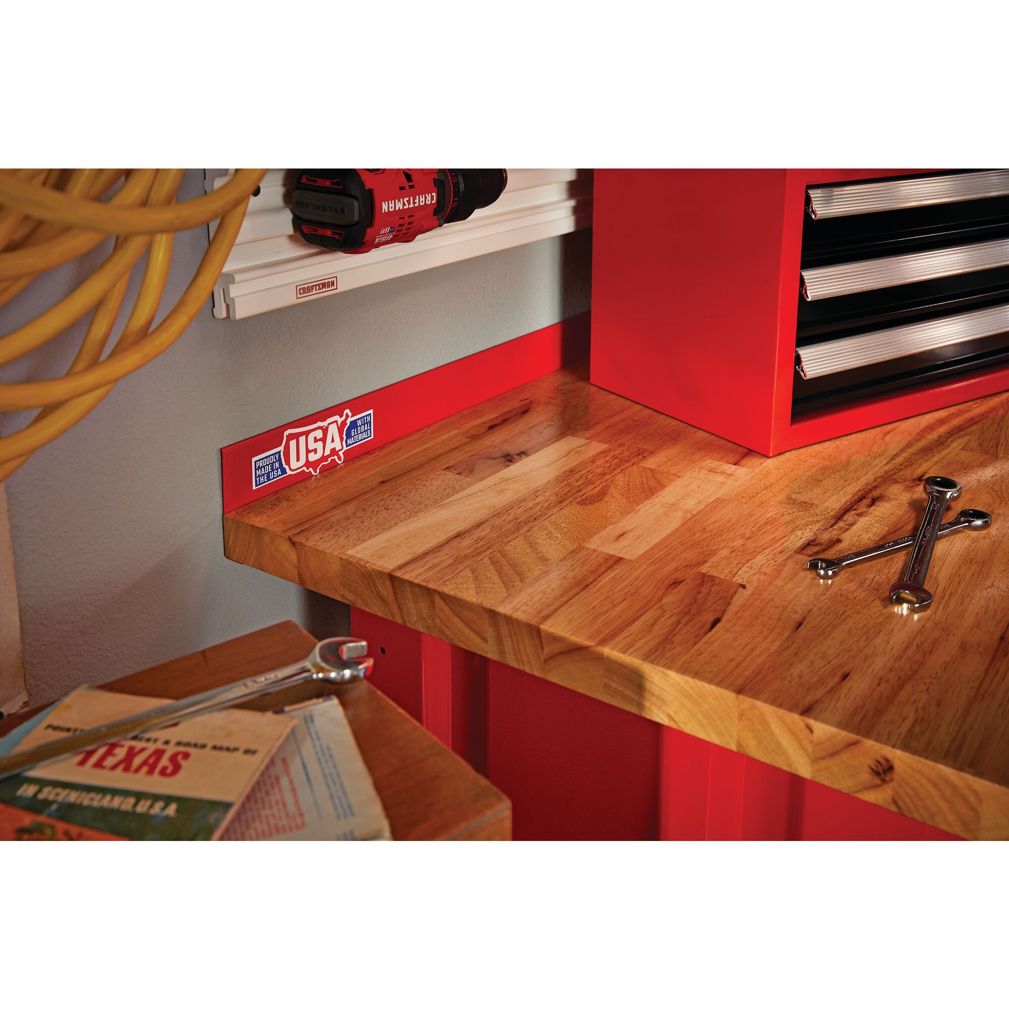 Spanners and other tool boxes placed on top of 6 foot wide Workbench with Butcher Block Top.