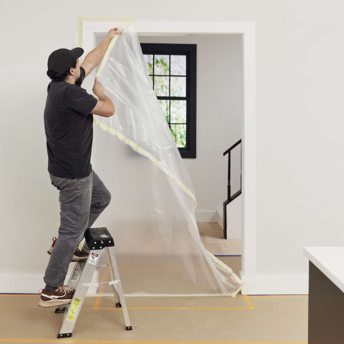 FrogTape<sup>®</sup> Double-Sided Poly-Hanging Containment Tape Application Image 3