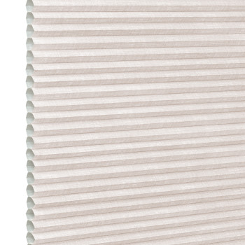 Beige pleated cellular (honeycomb) shade, horizontal ridges with visible open cells at left edge; fully lowered and closed, softly diffusing daylight in a neutral, featureless interior close-up.