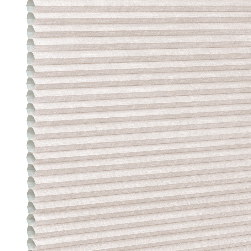 Beige pleated cellular (honeycomb) shade, horizontal ridges with visible open cells at left edge; fully lowered and closed, softly diffusing daylight in a neutral, featureless interior close-up.