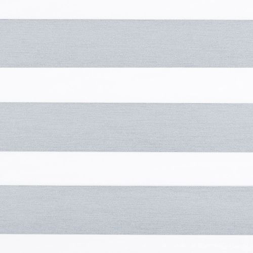 Horizontal dual-layer (zebra) roller blind covering a window, showing alternating textured gray opaque and white sheer bands that filter light; close-up view with neutral interior lighting.