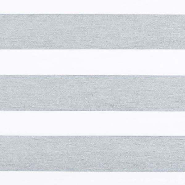 Horizontal dual-layer (zebra) roller blind covering a window, showing alternating textured gray opaque and white sheer bands that filter light; close-up view with neutral interior lighting.