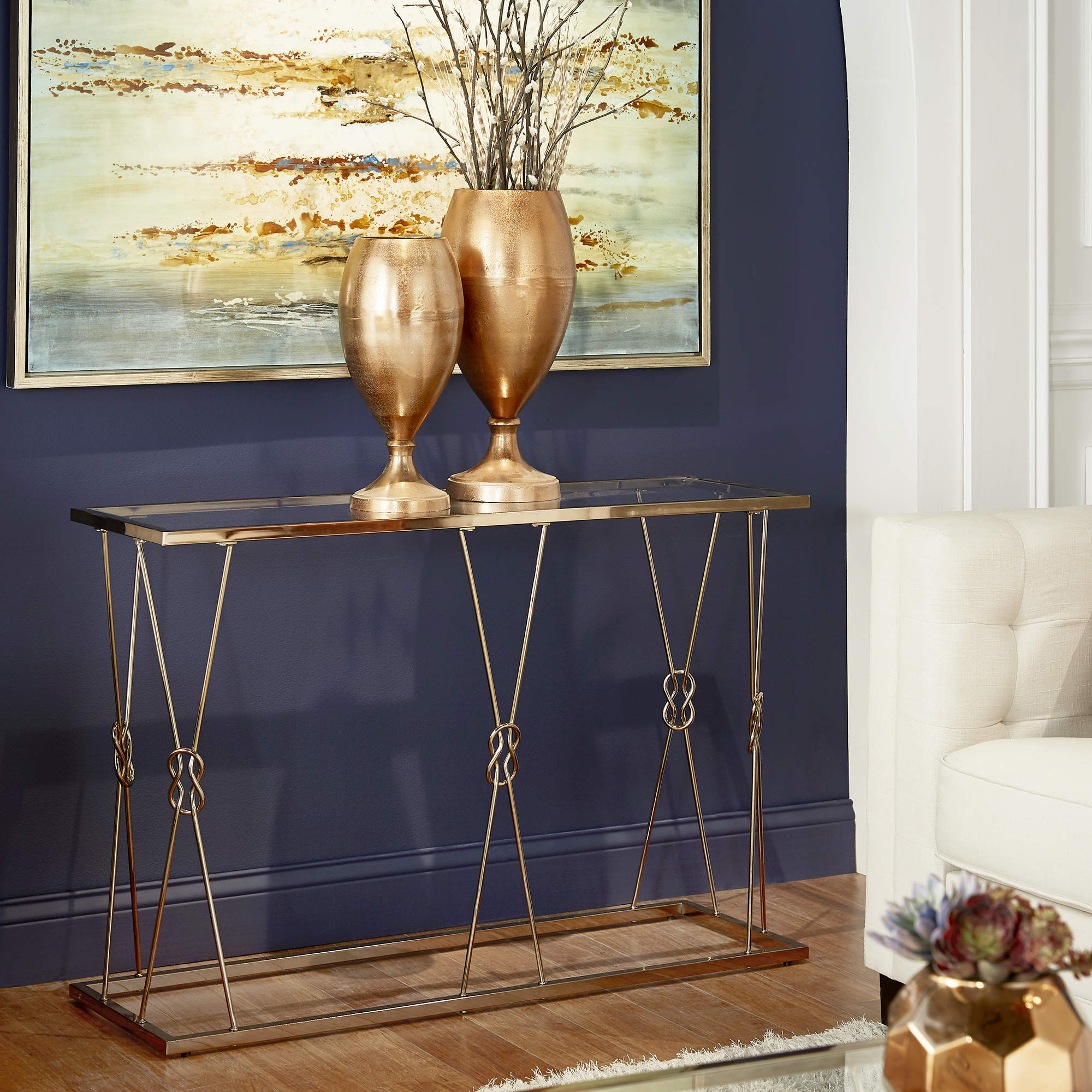 Champagne Gold Finish with Reef Knot Frame and Glass Top Sofa Table
