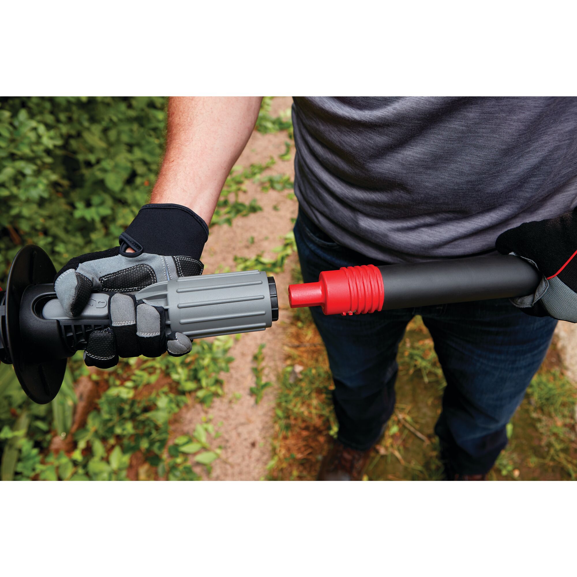 Padded grip and 180 degree pivoting head feature of 20 volt 18 inch cordless pole hedge trimmer kit.