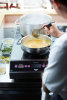 208- to 240-volt Professional-Series induction range with dual 2,900-watt front-to-back hobs